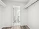 Spacious walk-in closet with shelving leads into a bright bathroom at 5400 Roswell Rd # C3, Atlanta, GA 30342