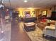 Spacious basement featuring a cozy fireplace, wood paneling, and ample seating creating a welcoming space at 359 Cornish Mtn Rd, Oxford, GA 30054