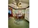 Cozy dining area featuring a ceiling fan and a traditional dining set, perfect for Gathering meals at 359 Cornish Mtn Rd, Oxford, GA 30054