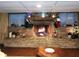 Cozy room featuring a brick fireplace with mantel decorations, offering a warm and inviting ambiance at 359 Cornish Mtn Rd, Oxford, GA 30054