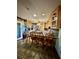 Eat-in kitchen with wooden cabinets, counter seating, and modern appliances at 359 Cornish Mtn Rd, Oxford, GA 30054