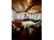 Spacious living room with hardwood ceiling and wall of windows at 359 Cornish Mtn Rd, Oxford, GA 30054
