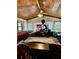 Cozy living room with hardwood ceiling and wall of windows at 359 Cornish Mtn Rd, Oxford, GA 30054
