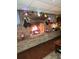 Charming living room features a brick fireplace and cozy decor, perfect for relaxing evenings at 359 Cornish Mtn Rd, Oxford, GA 30054