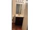 This is a bathroom that contains a sink with brown cabinets at 2705 Greystone Pl, Austell, GA 30106