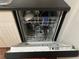 This is a dish washer that is full of clean dishes at 2705 Greystone Pl, Austell, GA 30106