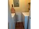 Laundry room with washer, dryer, and ironing board at 2705 Greystone Pl, Austell, GA 30106