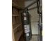 Utility room with water heater, shelving, and furnace at 2705 Greystone Pl, Austell, GA 30106