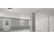 Unfinished basement with a door and window and neutral-colored walls, ready for your personalized design at 370 Charlyne Way, Dacula, GA 30019
