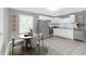 Modern kitchen with stainless steel appliances and white cabinets at 3803 Clovis Ct, Atlanta, GA 30331