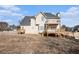 Spacious backyard with two levels of wood decks provides space for outdoor living at 2612 Grove Park Ln, Conyers, GA 30094