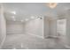 Large basement featuring tiled floors, recessed lighting, and access to a bathroom at 2612 Grove Park Ln, Conyers, GA 30094