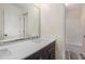 Bathroom with a double sink vanity, large mirror, and a separate shower and tub at 2612 Grove Park Ln, Conyers, GA 30094