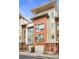 Modern townhouse showcasing a brick facade, sleek windows, and a convenient one-car garage at 966 Moda Dr, Atlanta, GA 30316
