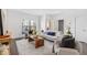 Bright living room with a modern design, large windows, and comfortable seating arrangement at 966 Moda Dr, Atlanta, GA 30316