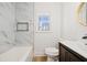 Clean bathroom, featuring a bathtub, updated vanity and flooring at 2686 Abilene Trl, Snellville, GA 30078