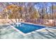 Inviting rectangular pool in a wooded backyard setting at 2686 Abilene Trl, Snellville, GA 30078