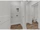 This laundry area is bright with white walls, a utility sink, and a washer-dryer hookup at 822 Urban Grange Way, Suwanee, GA 30024