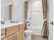 Bathroom vanity with a combination shower and bathtub at 913 Echo Park Dr, Suwanee, GA 30024