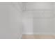Bright walk-in closet with ample shelving at 913 Echo Park Dr, Suwanee, GA 30024