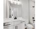 Bright bathroom with a modern vanity, white countertop, and shower-tub combo at 923 Echo Park Dr, Suwanee, GA 30024