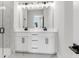 Modern bathroom with double vanity, sleek black hardware and marble countertops at 923 Echo Park Dr, Suwanee, GA 30024
