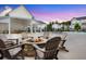Outdoor fire pit with seating at dusk, perfect for entertaining at 923 Echo Park Dr, Suwanee, GA 30024