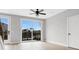 Open-concept living room with sliding glass doors to a patio with a view at 923 Echo Park Dr, Suwanee, GA 30024