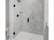 Stylish shower with glass door and tiled walls at 923 Echo Park Dr, Suwanee, GA 30024