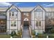 Charming condo with Tudor-style accents, gray trim, brick entryway and inviting curb appeal at 6851 Roswell Rd # D14, Atlanta, GA 30328