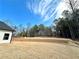 Large, newly landscaped back yard with a quiet, wooded perimeter offering privacy for the home at 15 Stratford Way, Kingston, GA 30145