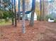 Spacious backyard with shed and wooded area offering privacy at 204 Apple Branch Dr, Woodstock, GA 30188