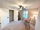 Bright bedroom with a desk, closet, and window at 204 Apple Branch Dr, Woodstock, GA 30188