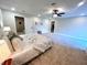 Bright bedroom with large bed, neutral tones and en-suite bathroom access at 204 Apple Branch Dr, Woodstock, GA 30188