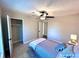 Spacious bedroom with a closet and ceiling fan at 204 Apple Branch Dr, Woodstock, GA 30188