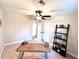 Bright bedroom or office with a desk and ceiling fan at 204 Apple Branch Dr, Woodstock, GA 30188