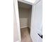 Large walk-in closet with neutral walls and carpeted floor at 204 Apple Branch Dr, Woodstock, GA 30188
