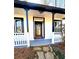 Modern front entry with dark door and stone pathway at 204 Apple Branch Dr, Woodstock, GA 30188