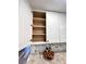 Open kitchen cabinets with ample storage space at 204 Apple Branch Dr, Woodstock, GA 30188
