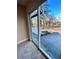 Sliding glass door with view of backyard and trees at 204 Apple Branch Dr, Woodstock, GA 30188
