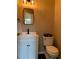 Stylish powder room featuring a modern vanity, black fixtures, and a framed mirror at 106 Puckett Ct, Canton, GA 30115