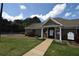 Well-maintained clubhouse with manicured lawn and inviting entrance at 106 Puckett Ct, Canton, GA 30115