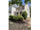 Attractive two-story home with brick accents and well-maintained landscaping at 106 Puckett Ct, Canton, GA 30115