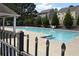 Inviting community pool with clear blue water, perfect for relaxation at 106 Puckett Ct, Canton, GA 30115