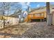 A backyard with a wooden deck, surrounded by a wooden fence at 1057 Falling Water Se Dr, Smyrna, GA 30080