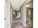 View of hallway and living room featuring gray walls and hardwood floors at 1057 Falling Water Se Dr, Smyrna, GA 30080