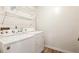 Laundry room features new washer and dryer at 1057 Falling Water Se Dr, Smyrna, GA 30080