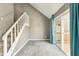 Living room with stairs and doors leading to deck at 1057 Falling Water Se Dr, Smyrna, GA 30080
