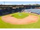 Interior view of a baseball field, showcasing the seating and field, with 