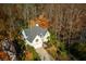 An amazing aerial view of the beautiful property and home, complete with a well manicured lawn and backyard at 1472 Lachona Ct, Atlanta, GA 30329